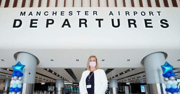 Joy when the first vacationers take off from the new “super terminal” at Manchester Airport - and the boss predicts that “we will get back on our feet by next summer”

