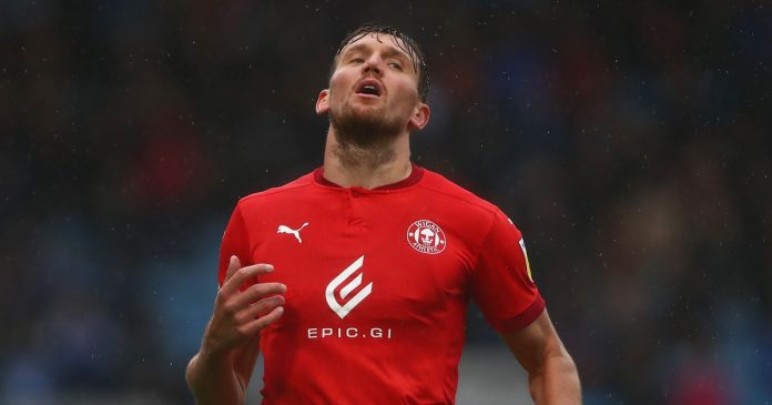 Wigan striker Charlie Wyke rushed to the hospital after collapsing in training

