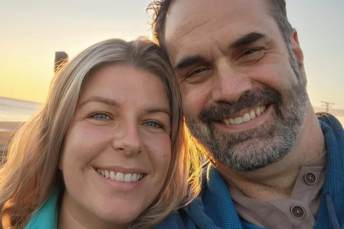 Happy ending as Wigan woman is reunited with partner after 18 months apart

